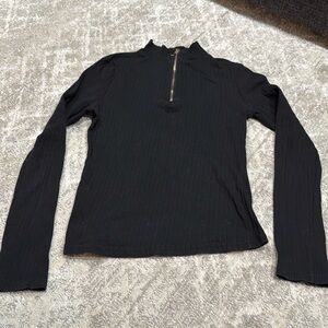 Black turtle neck quarter zip top